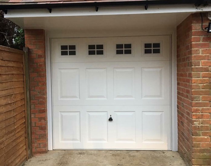 White up and over garage door.